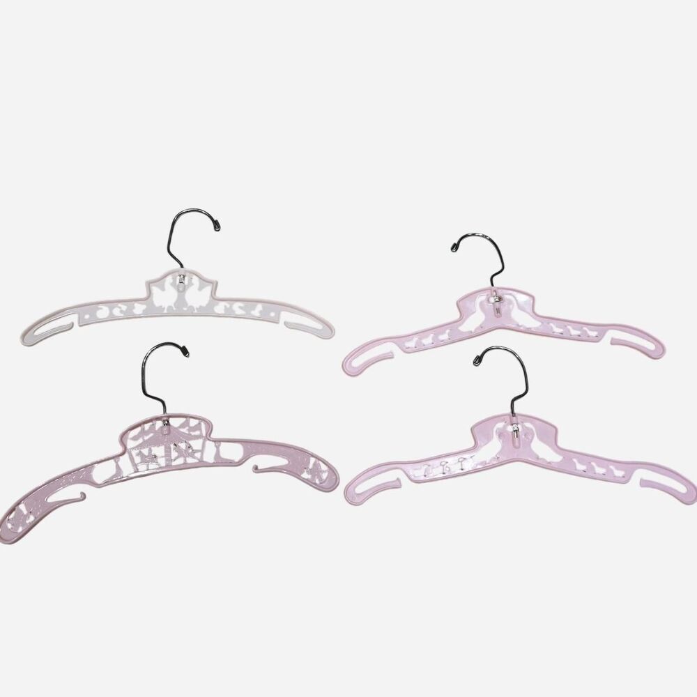 vintage pink hangers with cut-out designs